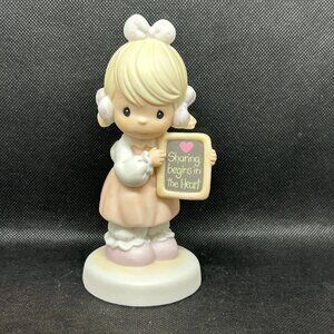 Precious Moments “Sharing Begins In The Heart" figurine
